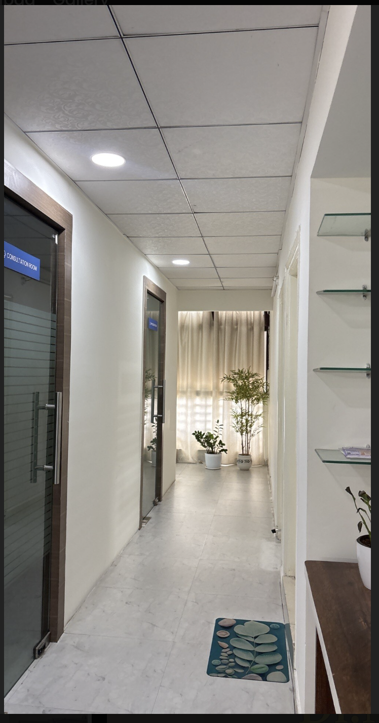 Corridor leading to consultation rooms at Dr. NK's Skin Clinic